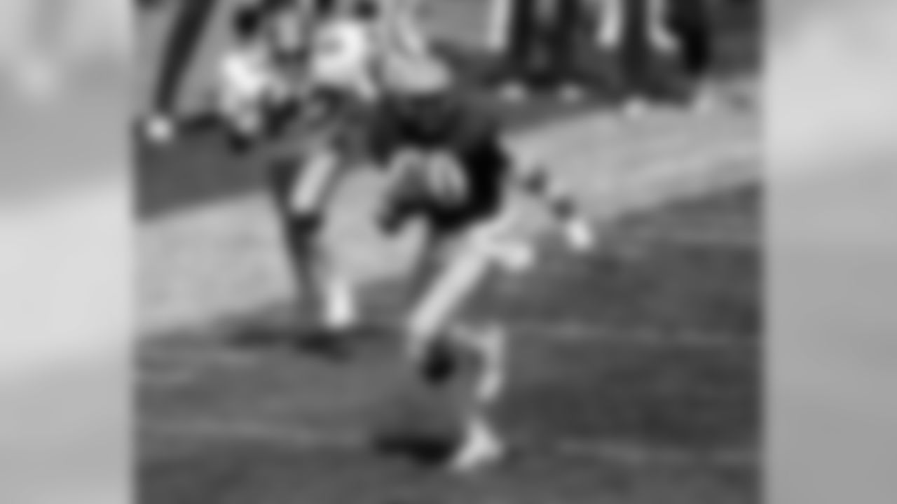 Sept. 13, 1981 - Hall of Fame WR James Lofton (80) races upfield as Falcons CB Bobby Butler chases in pursuit during a game in Green Bay. The Falcons defeated the Packers, 31-17.
