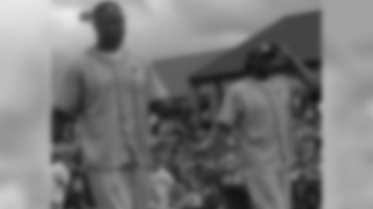 Cyril Obiozor and Desmond Bishop
