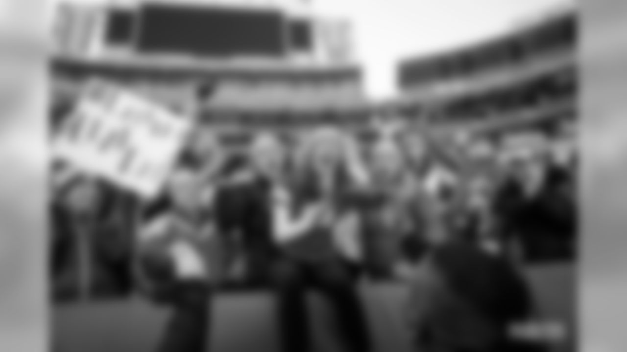 29 Packers fans attempt a Lambeau Leap at Lambeau Field on Saturday, Feb.29.