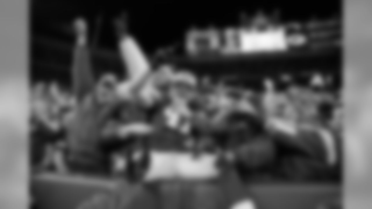 Nov. 15, 2009 - TE Spencer Havner (41) does the "Lambeau Leap" after scoring a touchdown against the Cowboys at Lambeau Field, on Nov. 15, 2009. The Packers won, 17-7.
