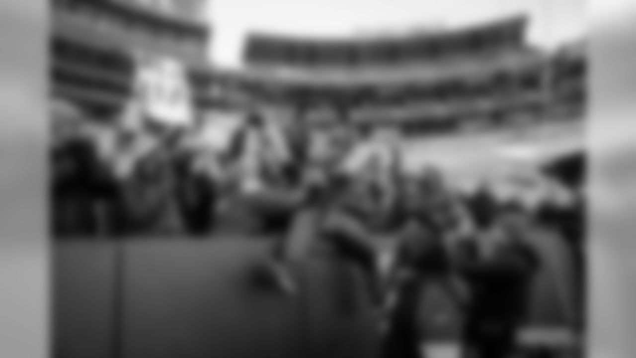 29 Packers fans attempt a Lambeau Leap at Lambeau Field on Saturday, Feb.29.
