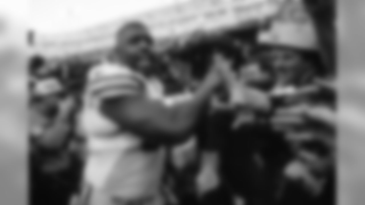 Jan. 6, 1996 - Reggie White celebrates after the game against the 49ers in San Francisco. The Packers won, 27-17, and advanced to the NFC Championship game to play Dallas. White led the team with 12 sacks during the `95 season.