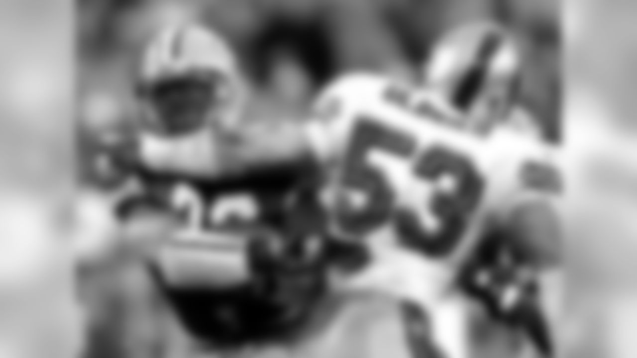 Nov. 23, 2003 - RB Ahman Green breaks away from 49ers LB Jeff Ulbrich in the second half in Green Bay, Wis. Green rushed for 154 yards in the Packers 20-10 win.