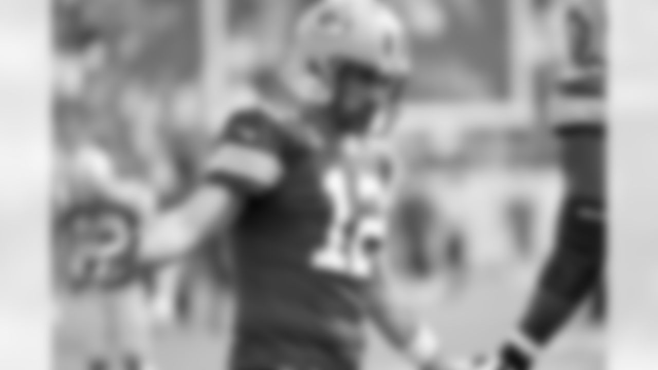 Green Bay Packers quarterback Aaron Rodgers (12) warms up before an NFL football game against the Tampa Bay Buccaneers Sunday, Sept. 25, 2022, in Tampa, Fla. (AP Photo/Jason Behnken)