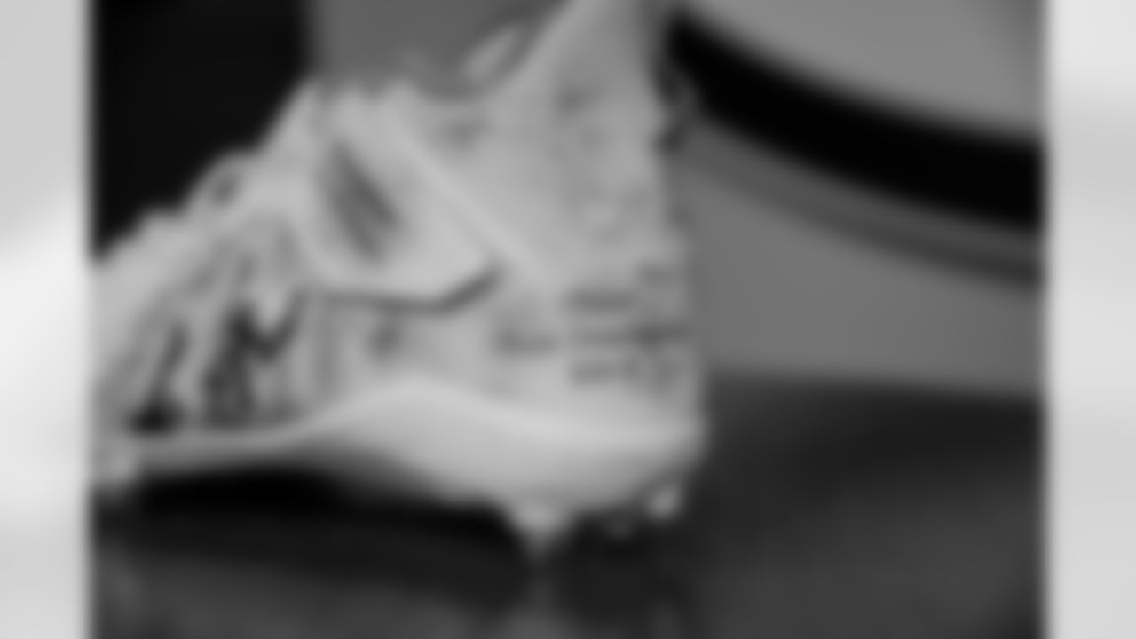 LB Ty Summers wearing TE John Lovett's cleats: Tunnel to Towers Foundation
