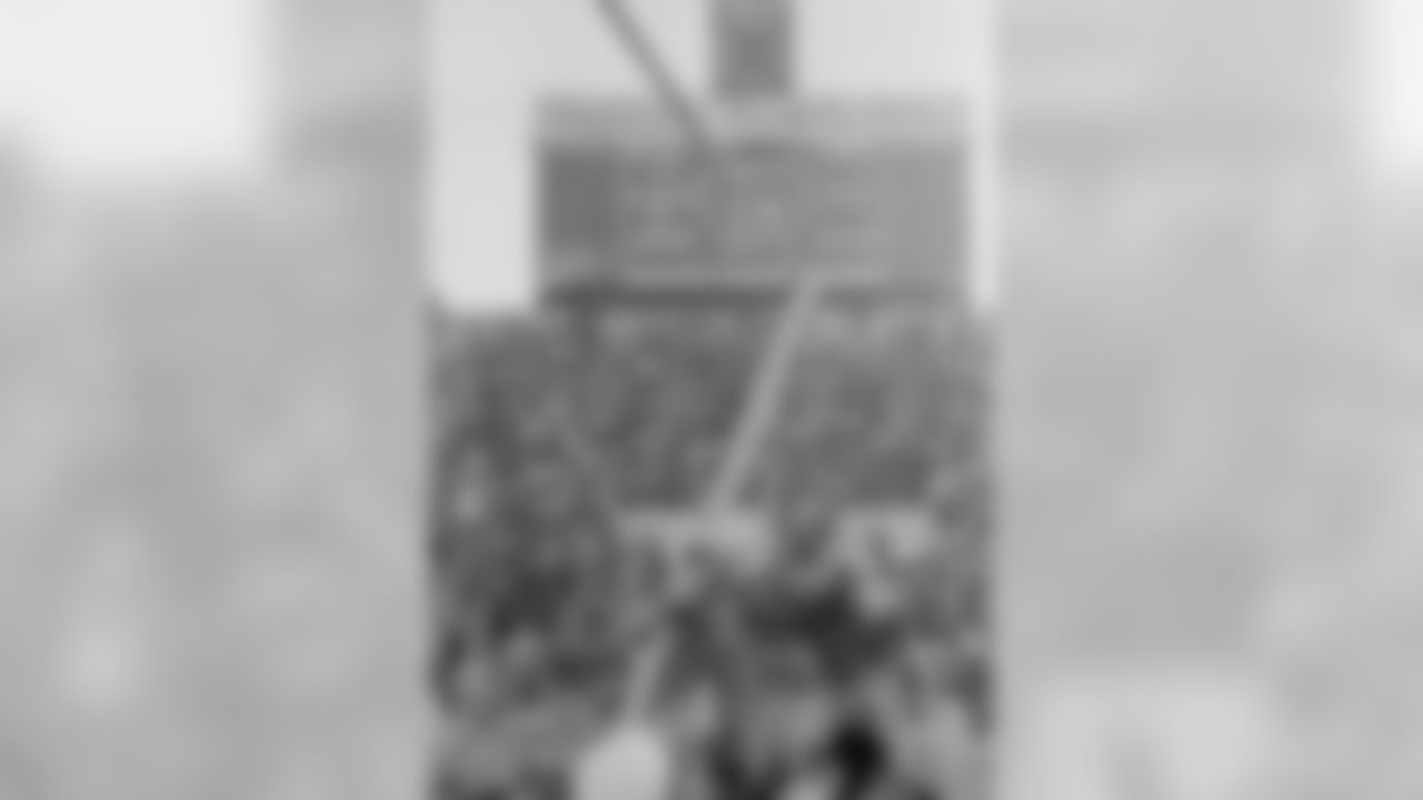 Dec. 31, 1967 - Fans storm the field and climb on the goal post at Lambeau Field in Green Bay after the Packers beat the Cowboys in the NFL Championship, 21-17. The two storied franchises both rank in the top four in postseason victories (Dallas-34 / Pittsburgh-33 / Green Bay-30 / San Francisco-30).