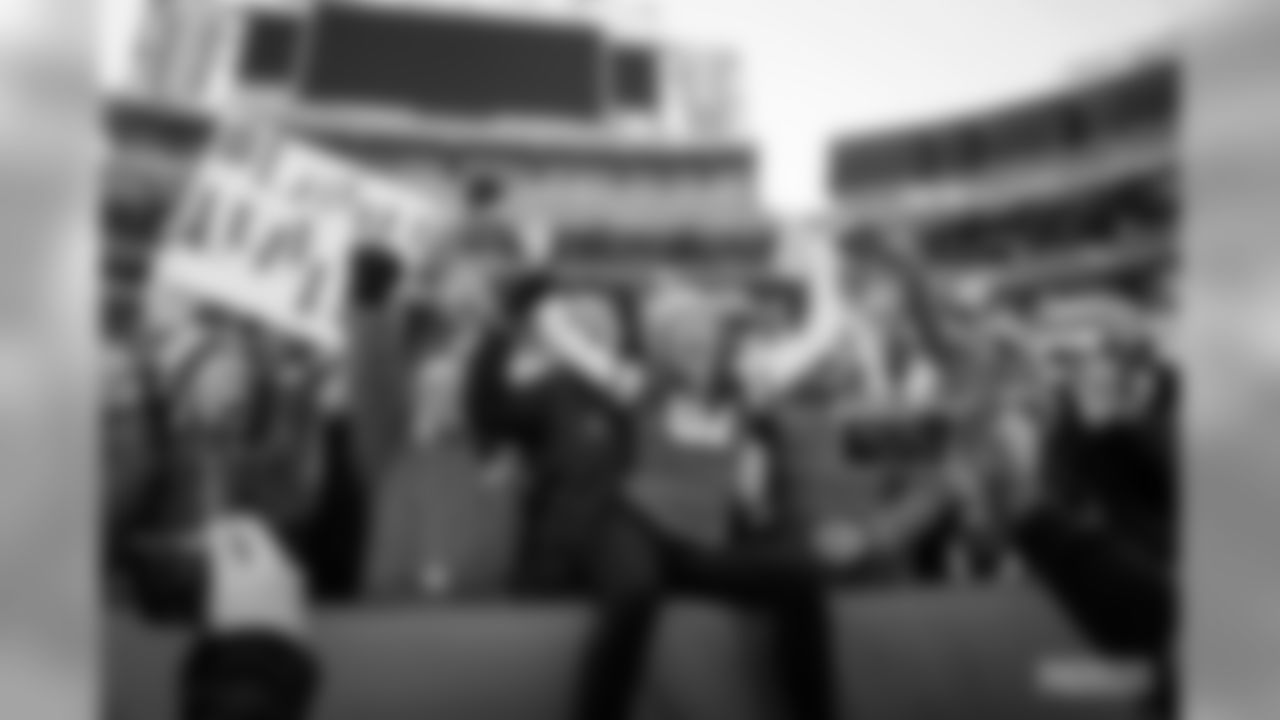 29 Packers fans attempt a Lambeau Leap at Lambeau Field on Saturday, Feb.29.