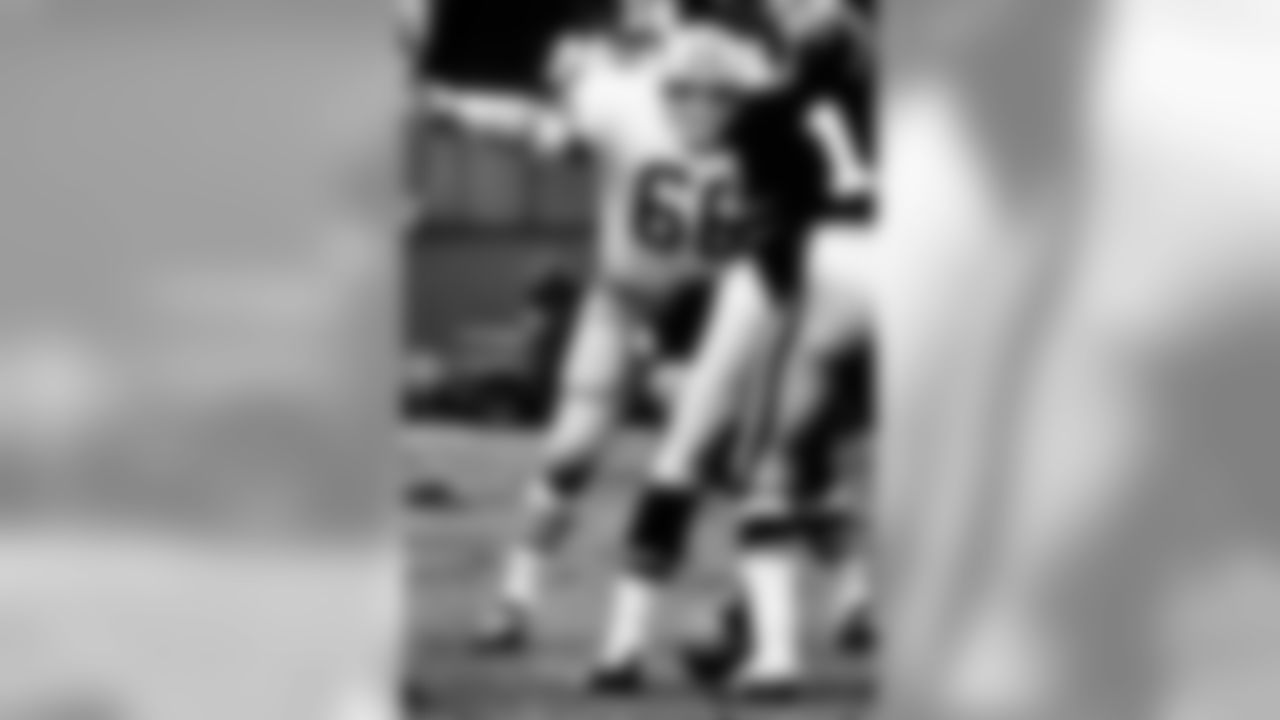 Oct. 6, 1968 - Hall of Fame linebacker Ray Nitschke (66) communicates with the defense while looking at Falcons QB Randy Johnson (11) on Oct. 6, 1968. The Packers defeated the Falcons, 38-7, at Fulton County Stadium in Atlanta.