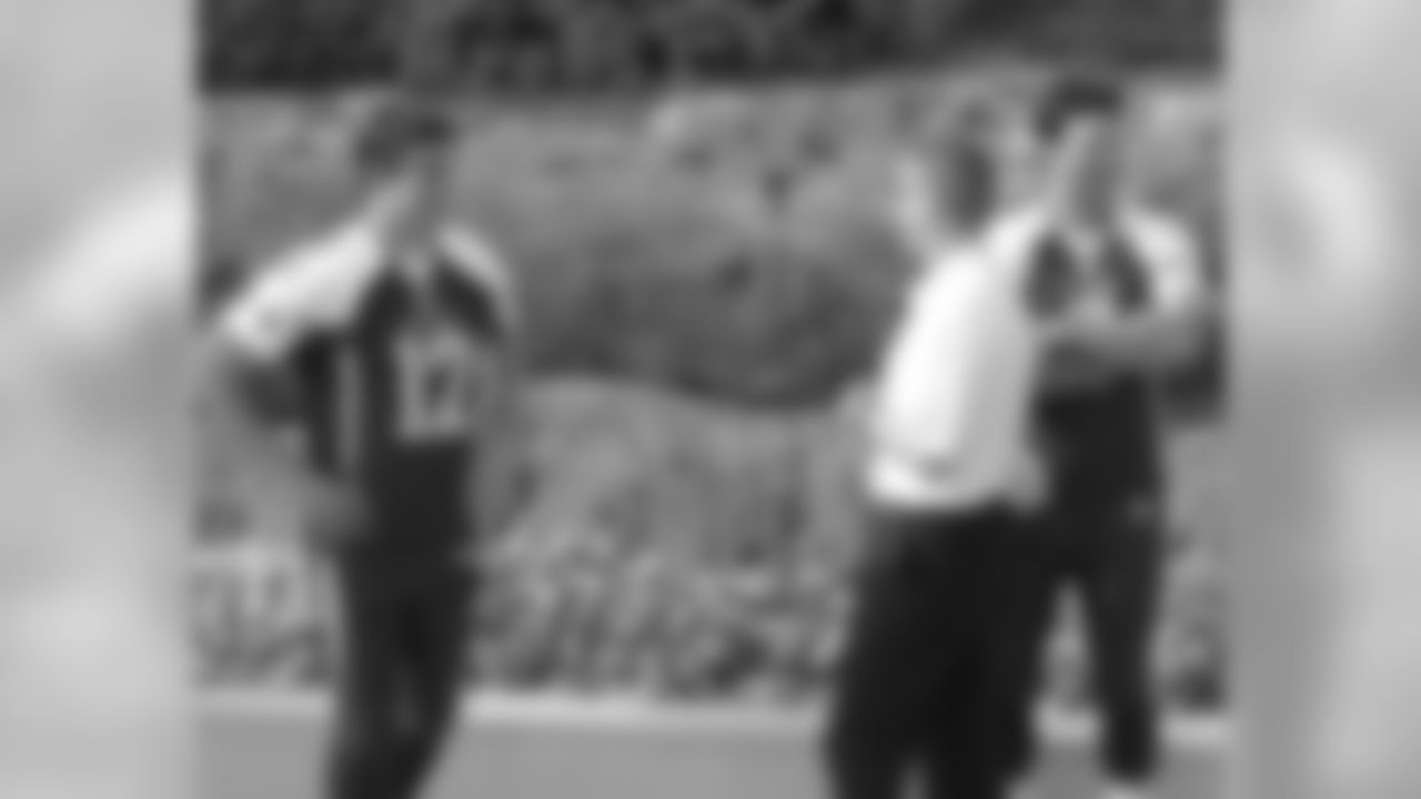 Aaron Rodgers, Cowboys offensive coordinator Jason Garrett and Cowboys quarterback Tony Romo
