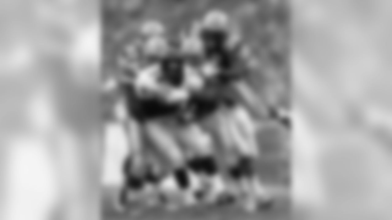 Dec. 31, 1995 - Packers DT Gilbert Brown (93), NT John Jurkovic (64), DE Matt LaBounty (97) and S LeRoy Butler (36) try to take down Falcons RB Craig Heyward (34) in the first quarter of the NFC Wild Card playoff. The Packers won, 37-20.