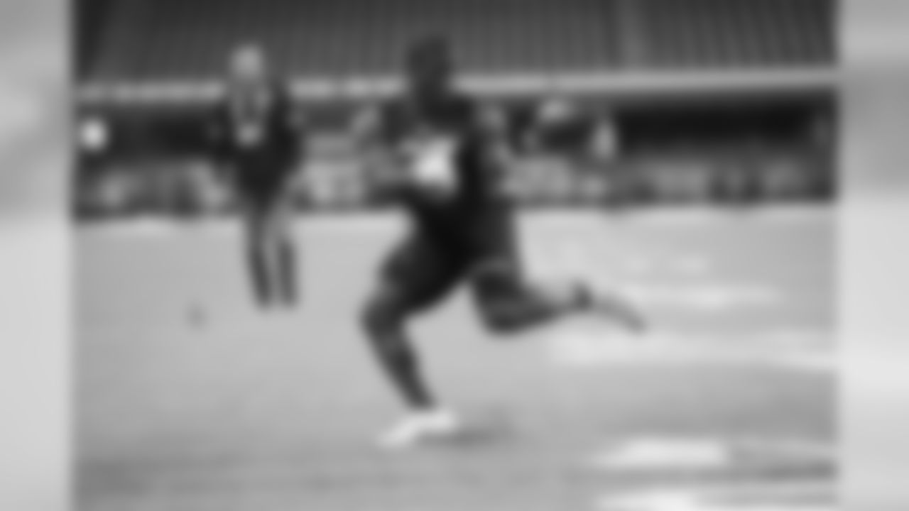 Arizona running back J.J. Taylor runs a drill during the 2020 NFL Scouting Combine, Friday, Feb. 28, 2020 in Indianapolis. (Logan Bowles/NFL)