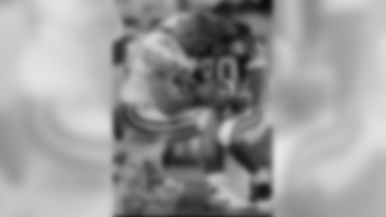 Nov. 5, 1995 - Cris Carter and Reggie White share a moment in prayer at the Packers bench after the game. Over the last 20 seasons (1994-2013), these teams have accounted for 15 NFC Central/North division championships.