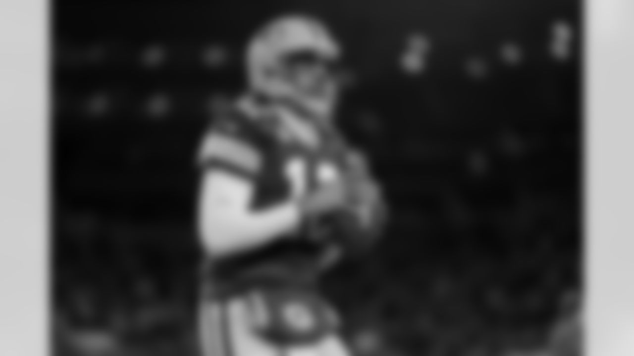 Green Bay Packers quarterback Aaron Rodgers (12) is seen warming up before an NFL Divisional Round playoff game against the San Francisco 49ers on Saturday, January 22, 2022 in Green Bay, Wisconsin. (Ryan Kang/NFL)