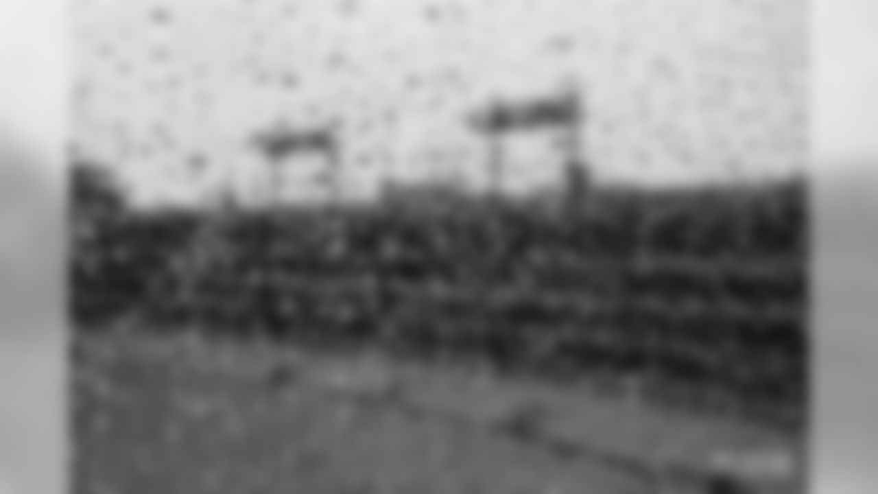 Photos of Lambeau Field on a rainy day.