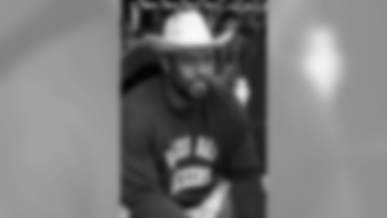 Jan. 14, 1996 - DE Reggie White (92) wears a cheesehead-brimmed hat before the 1995 NFC Championship against the Cowboys at Texas Stadium in Irving, Texas.
