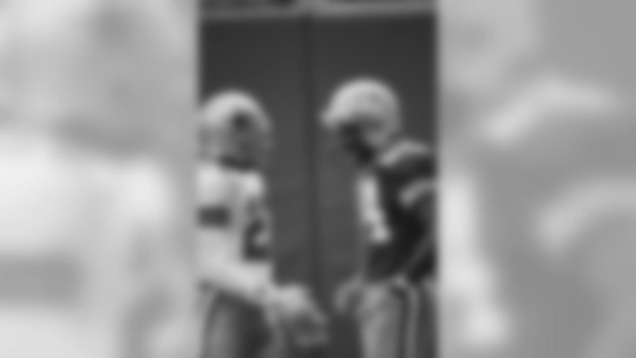Nov. 24, 1994 - WR Sterling Sharpe (84) talks with Emmitt Smith (22) of the Cowboys during pregame in Dallas on Thanksgiving Day, 1994.