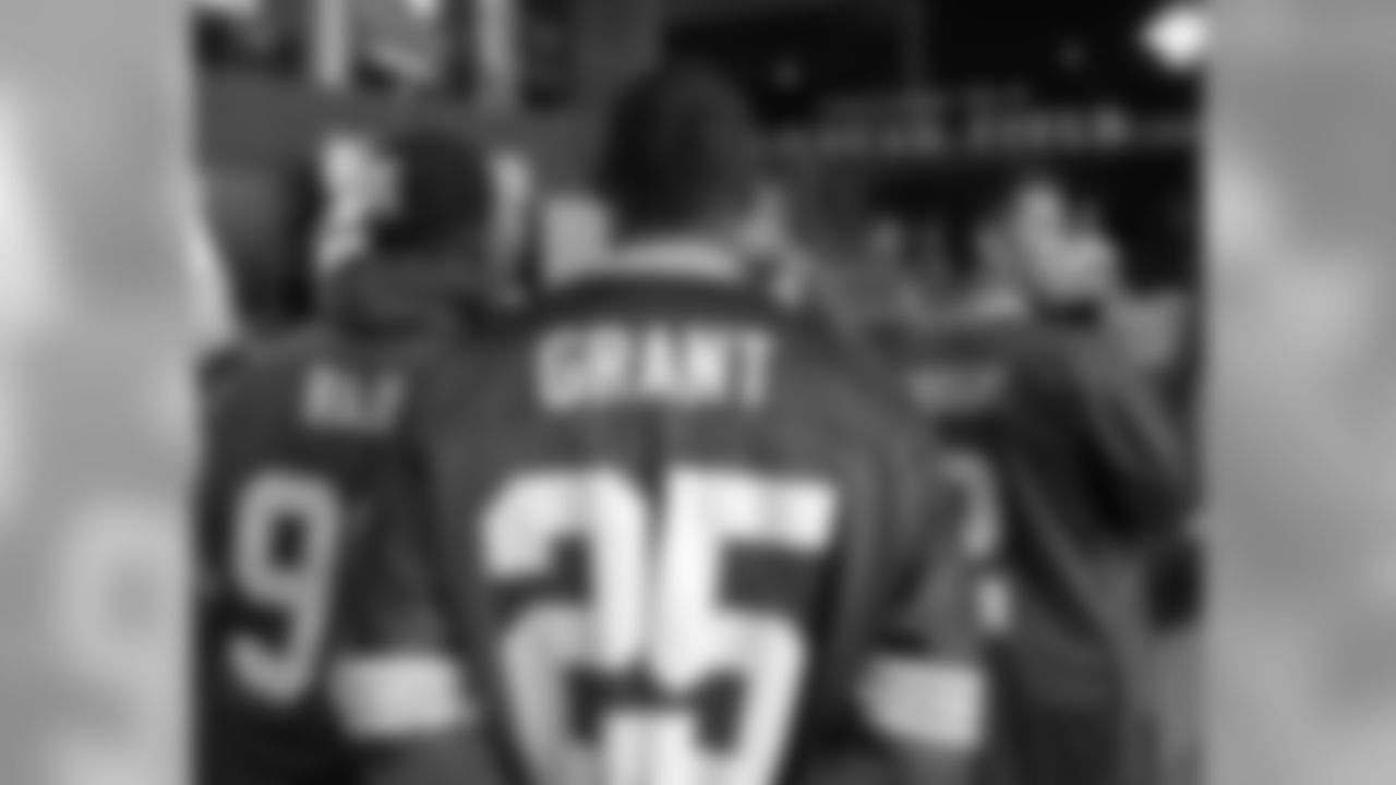 B.J. Raji, Ryan Grant and Mason Crosby