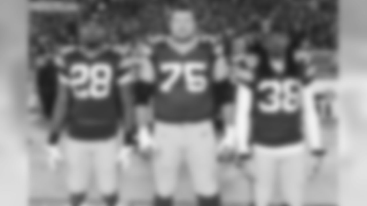 28 Sean Richardson, #75 Bryan Bulaga, #38 Tramon Williams