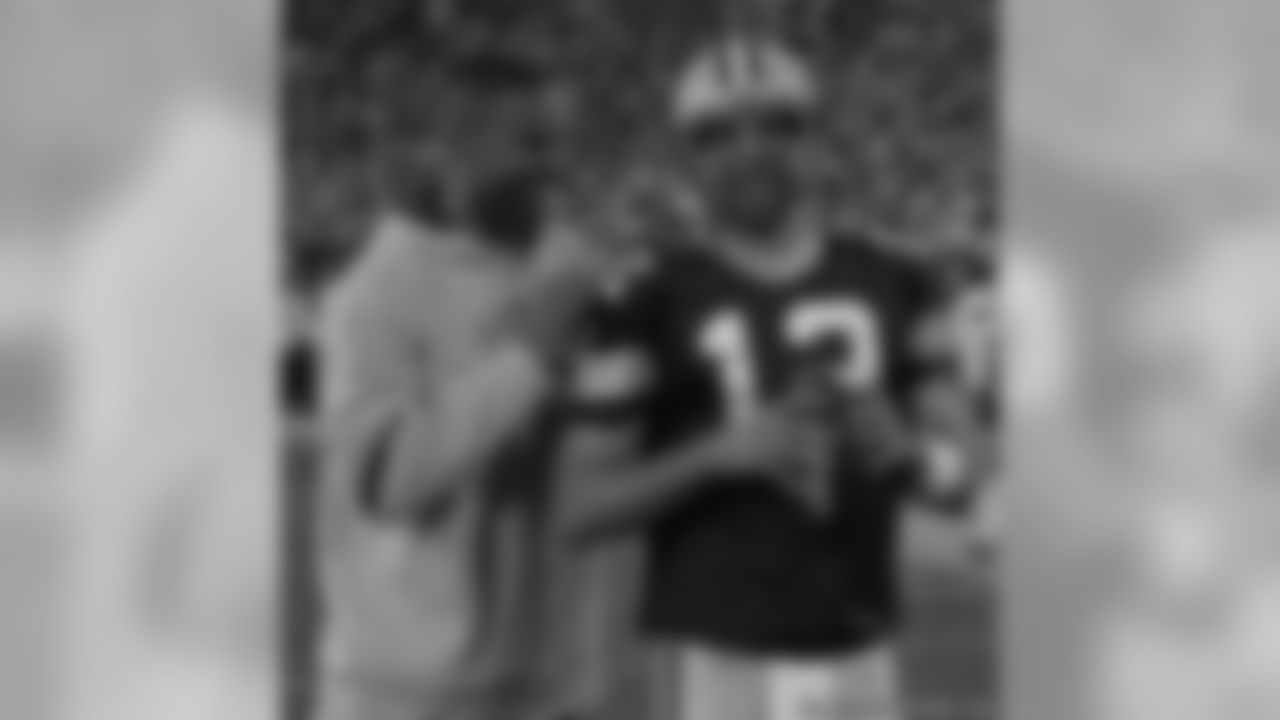 Ruvell Martin and Aaron Rodgers