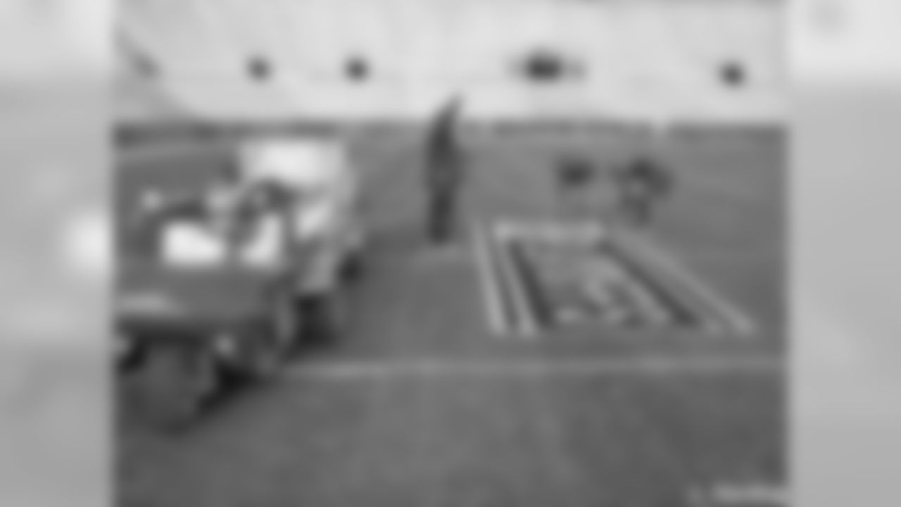 Packers Grounds Crew Prepares Lambeau Field For Playoff Game