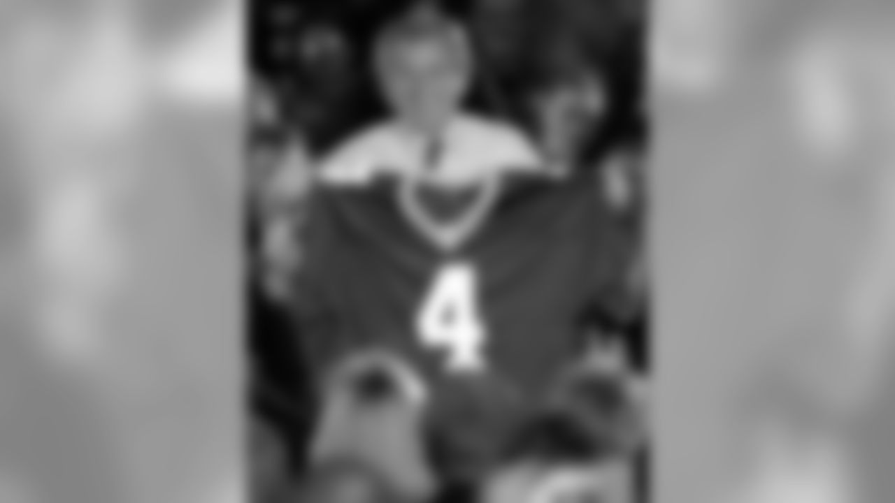 George W. Bush with Brett Favre jersey during 2000 campaign