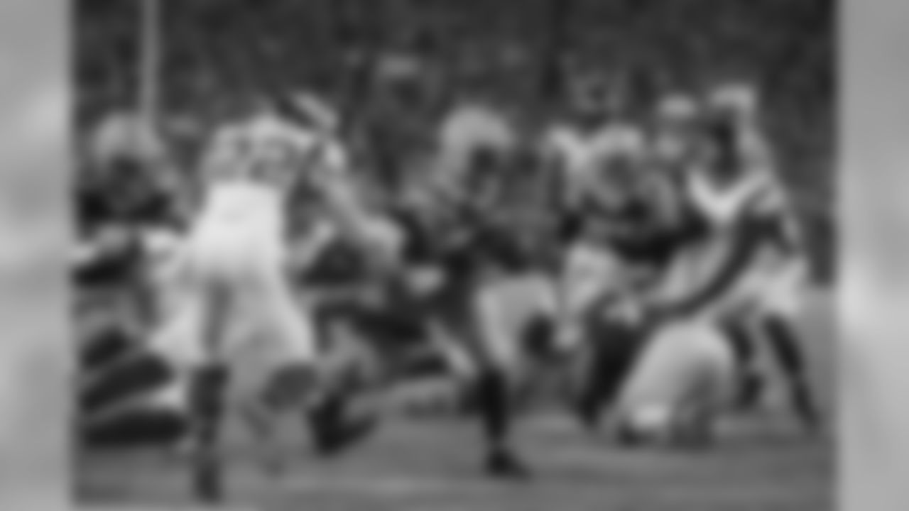FB John Kuhn rushes for a touchdown