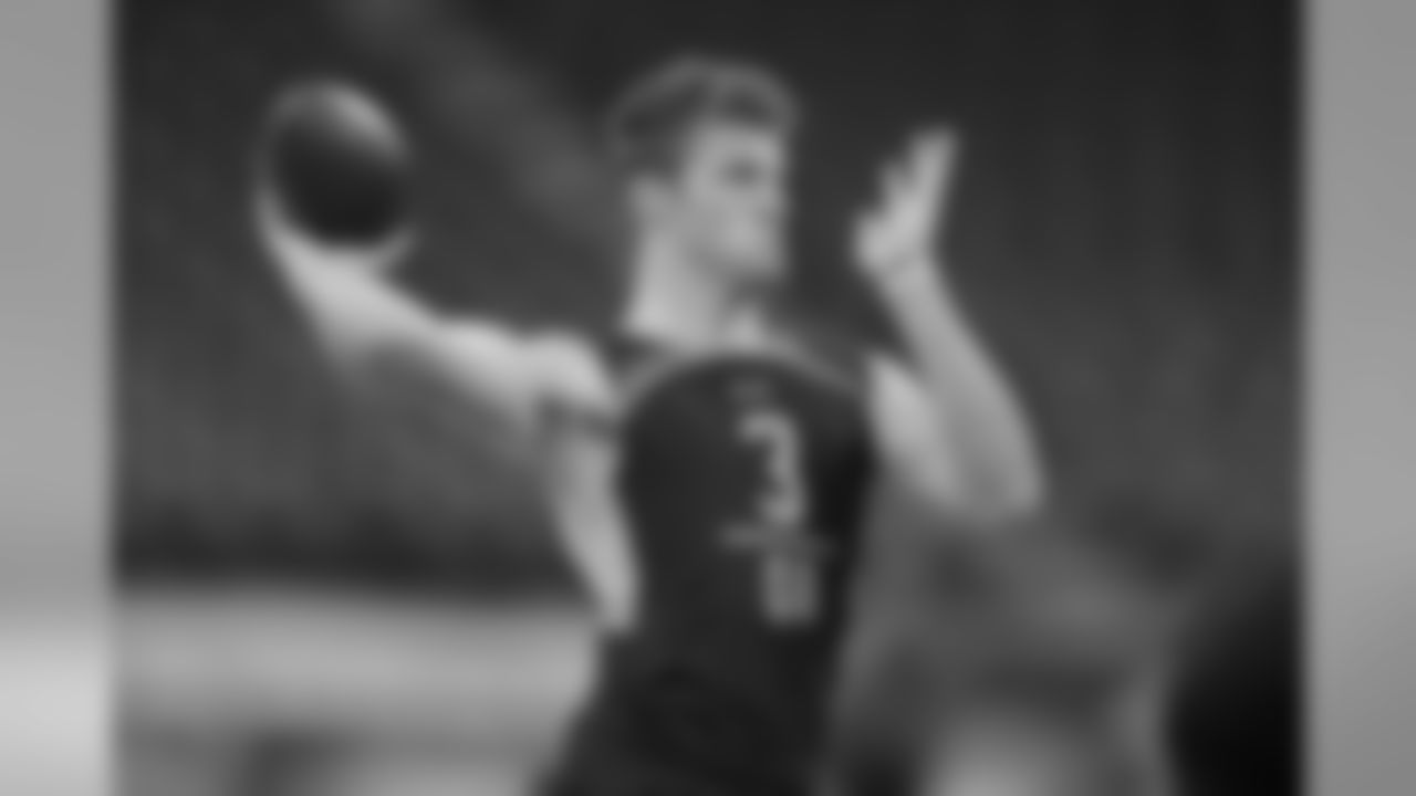 Mississippi State quarterback Nick Fitzgerald runs a drill at the NFL football scouting combine in Indianapolis, Saturday, March 2, 2019. (AP Photo/Michael Conroy)