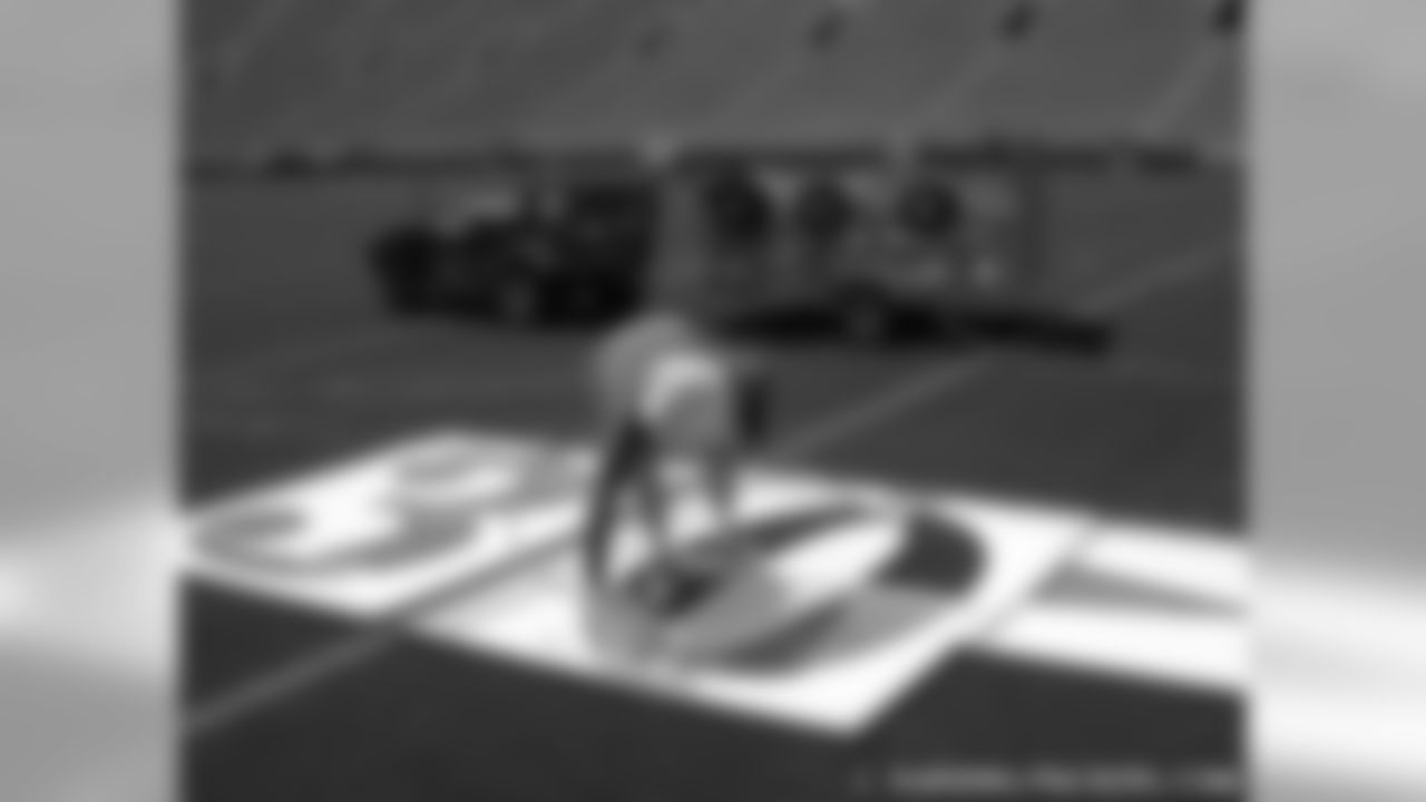 Packers Field Crew Makes Preparations For Family Night