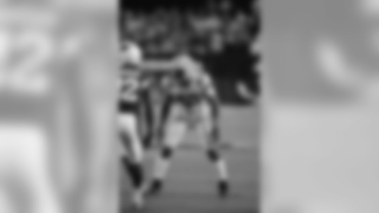 Burnett holds a free youth football camp in his community, Clayton County (Ga.), every summer
