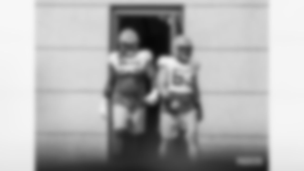 G/T Billy Turner and C Corey Linsley