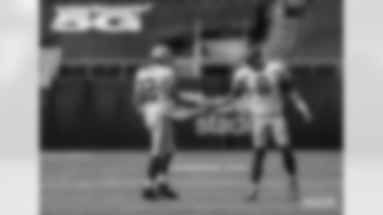 Quarterbacks Aaron Rodgers and Tim Boyle