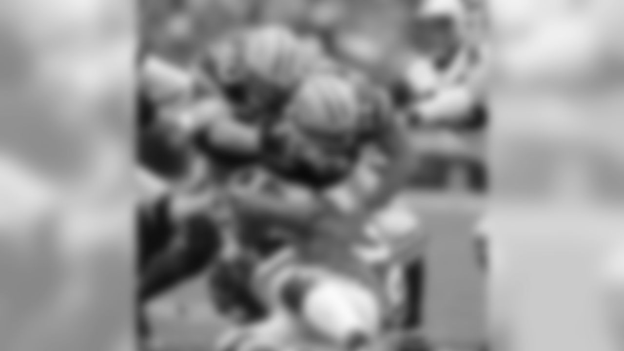 A.J. Hawk, Charles Woodson and Ryan Pickett
