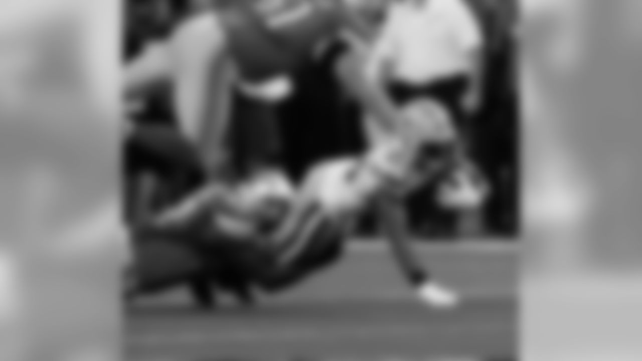 Casey Hayward is tackled after his interception return in the Green Bay Packers at Detroit Lions game.
