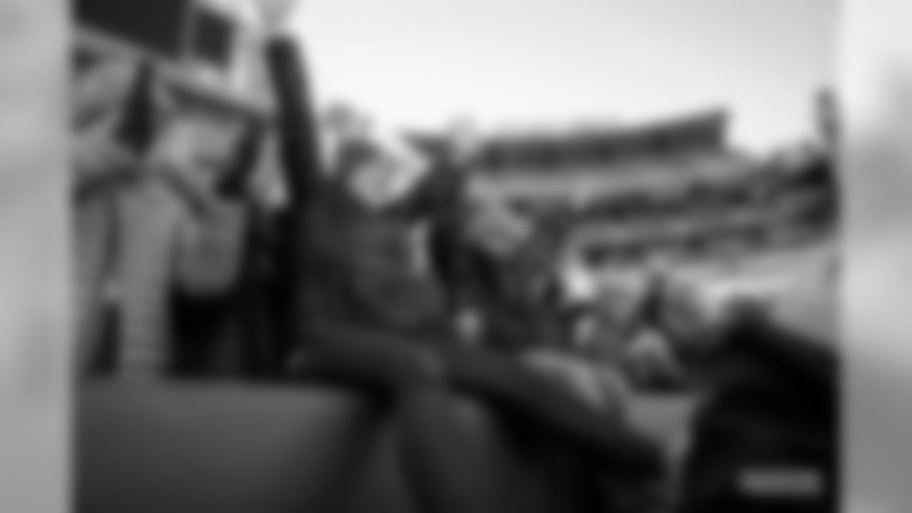 29 Packers fans attempt a Lambeau Leap at Lambeau Field on Saturday, Feb.29.