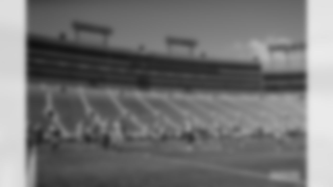 Players warming up inside Lambeau Field