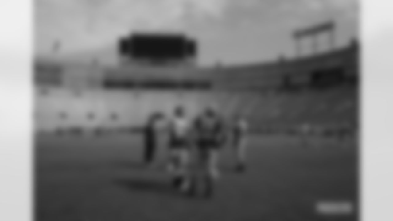 G Lucas Patrick and QB Aaron Rodgers