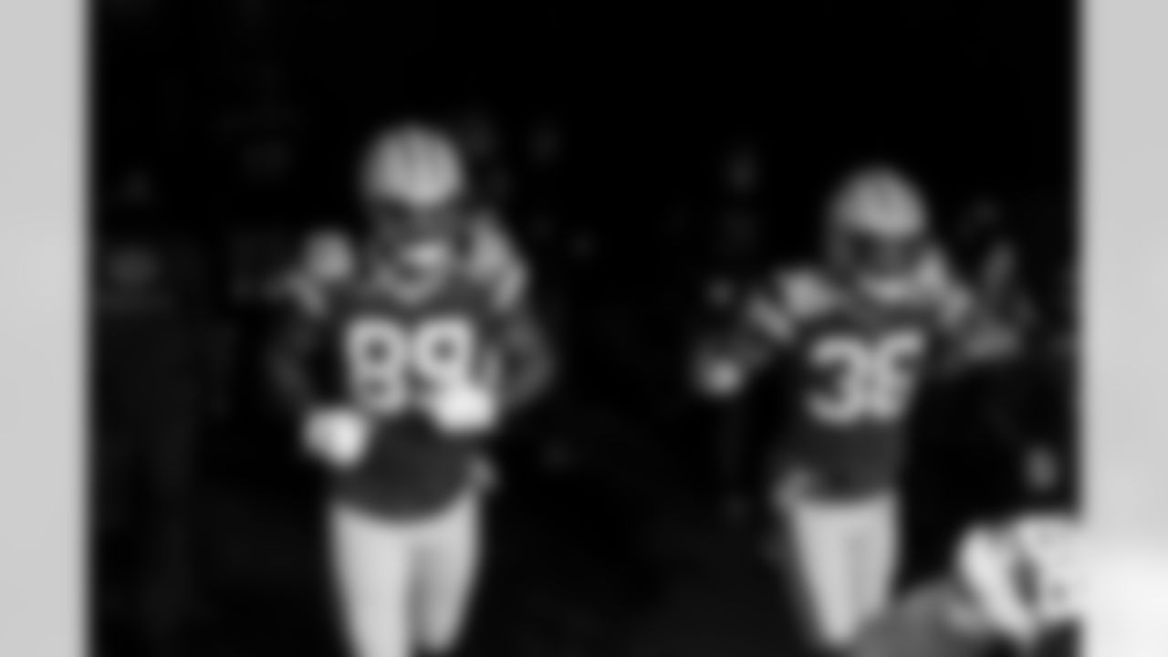 TE Marcedes Lewis and S Vernon Scott