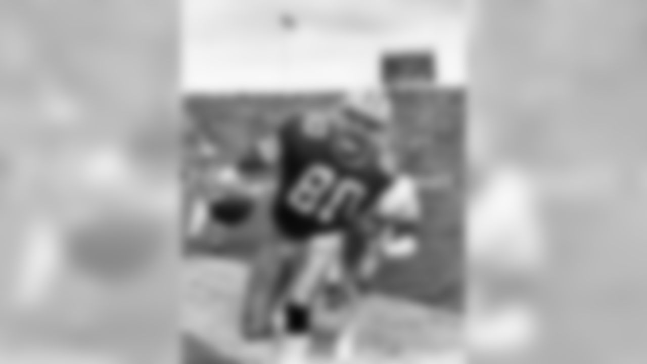 Oct. 15, 1985 - WR James Lofton steps out of bounds after hauling in a pass near the sidelines from QB Lynn Dickey. In a 50-degree game at Lambeau Field, the Packers went on to a 43-10 win.