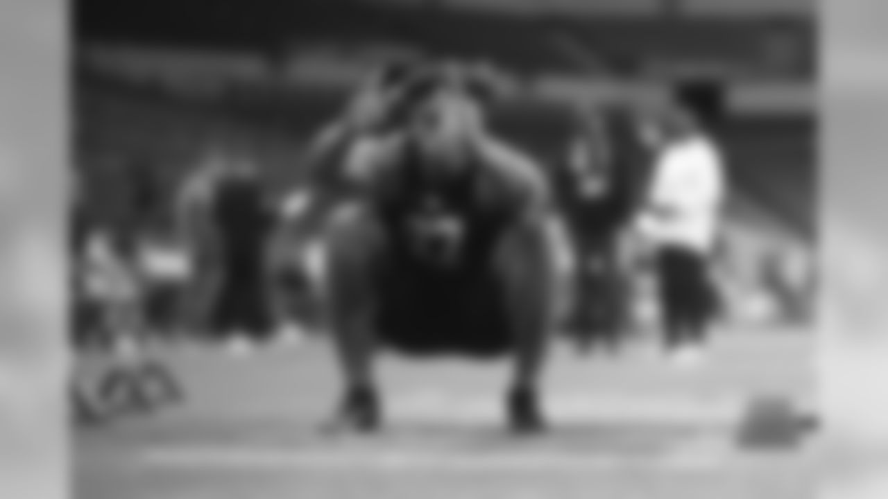Wisconsin running back Jonathan Taylor participates in the broad jump during the 2020 NFL Scouting Combine, Friday, Feb. 28, 2020 in Indianapolis. (Logan Bowles/NFL)
