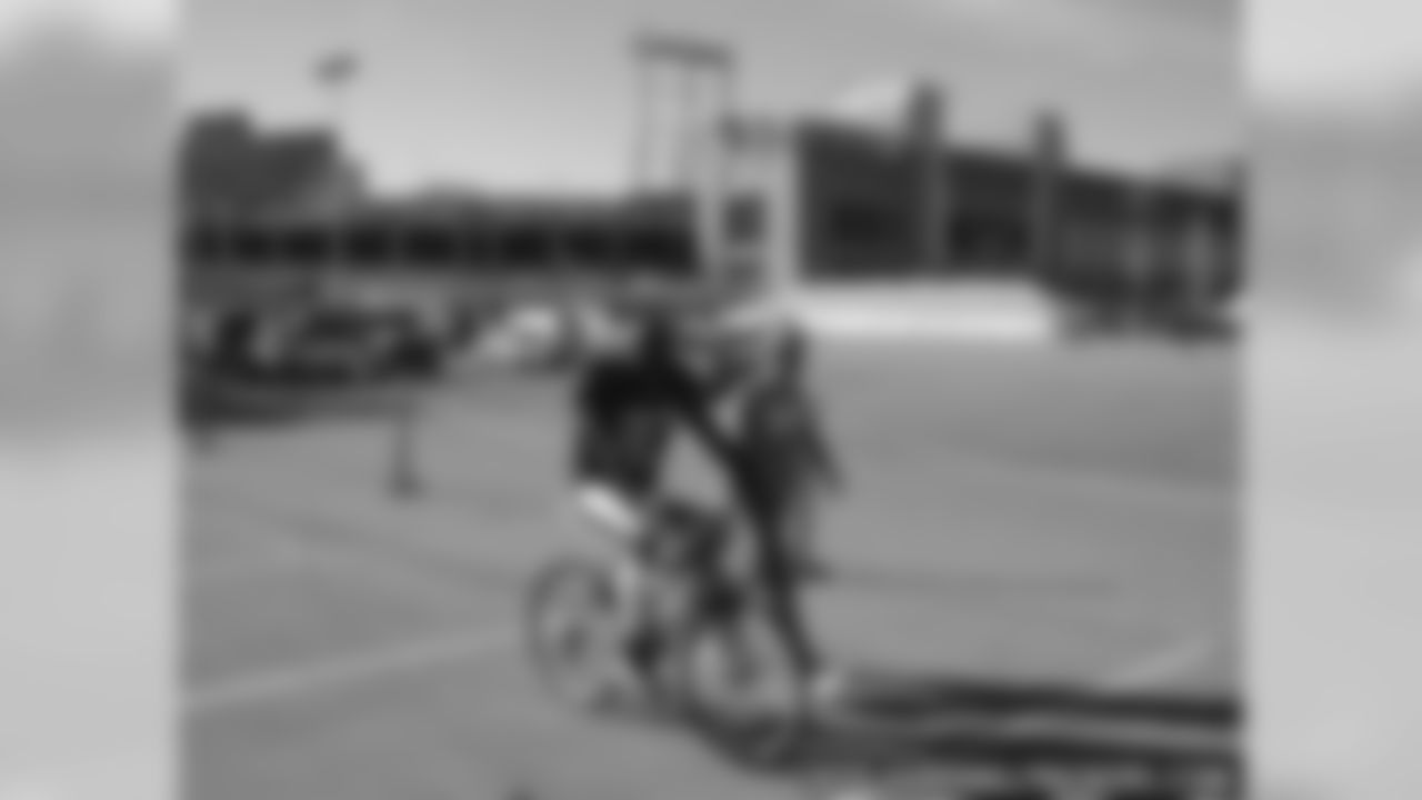 Bills Ride Bikes To Meet Packers At Practice