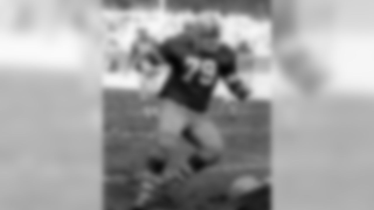 Nov. 24, 1955 - Packers DT Dave Hanner (79) runs towards the ball carrier in Detroit. The Lions defeated the Packers, 24-10. No other NFL teams have played every year since 1932, when the Packers and the Lions, then known as the Portsmouth (Ohio) Spartans, began their yearly home-and-home series.