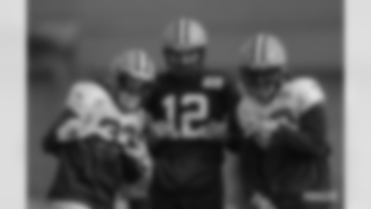 RB Aaron Jones, QB Aaron Rodgers and RB Jamaal Williams