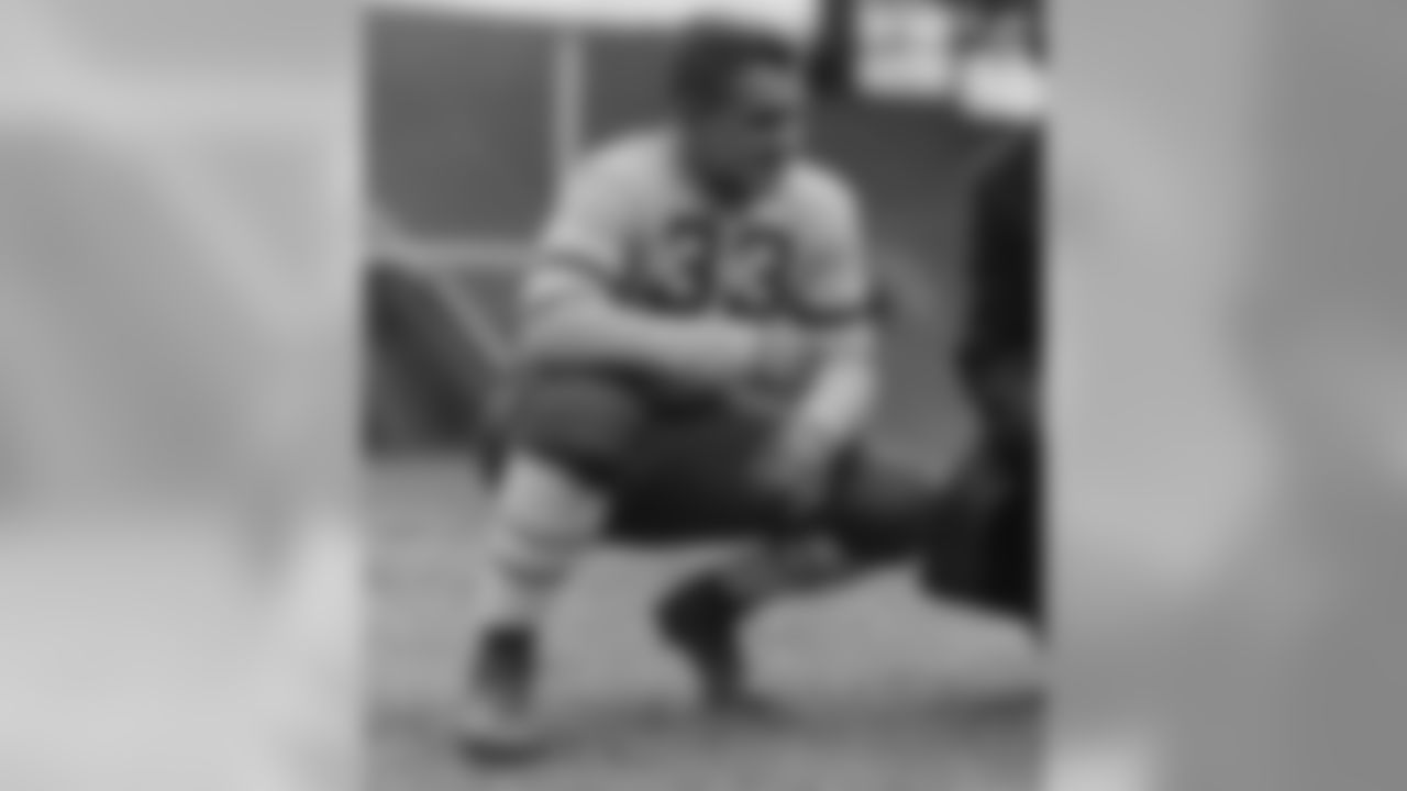 Signed by the Packers as a rookie free agent in 1933. Led Green Bay in rushing twice (1933 and 1935) and was a member of the 1936 World Championship team. Scored 90 career points as a back and kicker, and was inducted into the Packers Hall of Fame in 1973. Died in 1978. (Pictured in his Michigan State uniform)