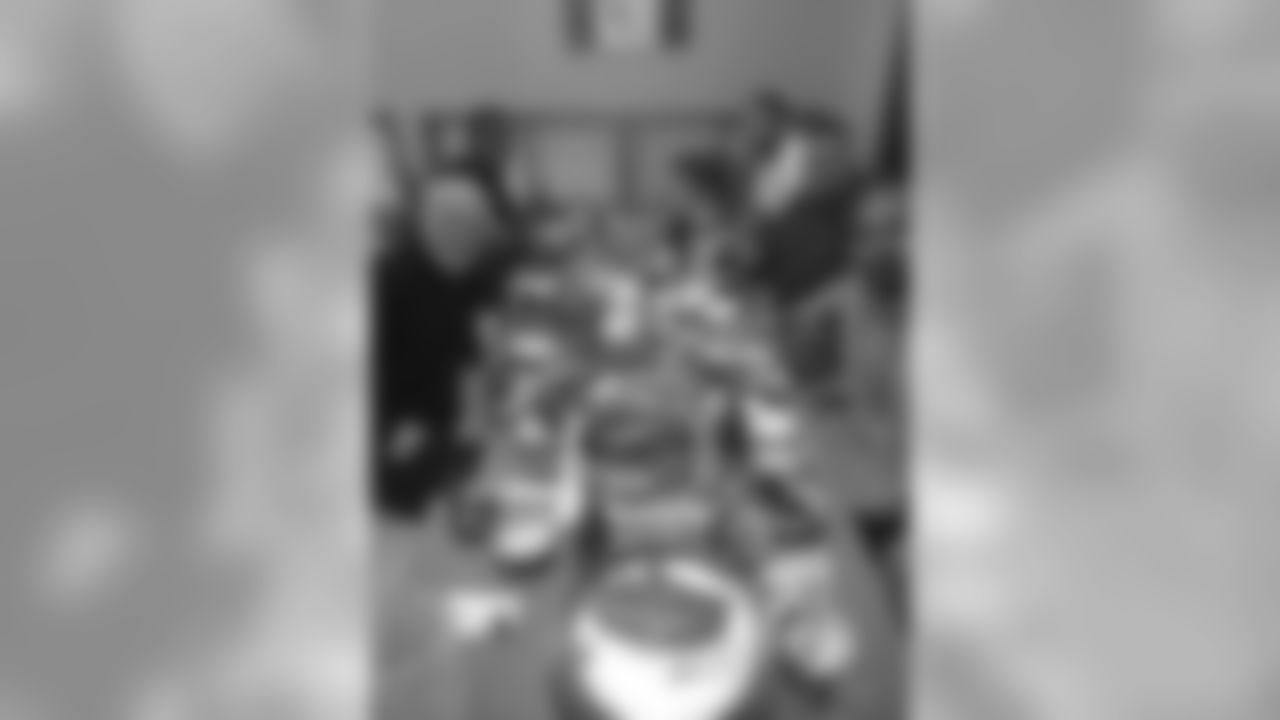Group photo while eating some authentic food.