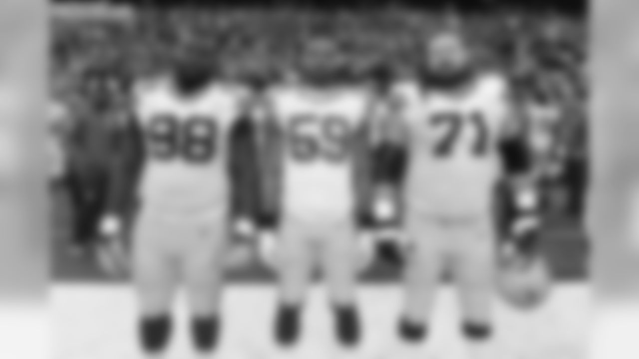 98 Letroy Guion, #59 Brad Jones, #71 Josh Sitton