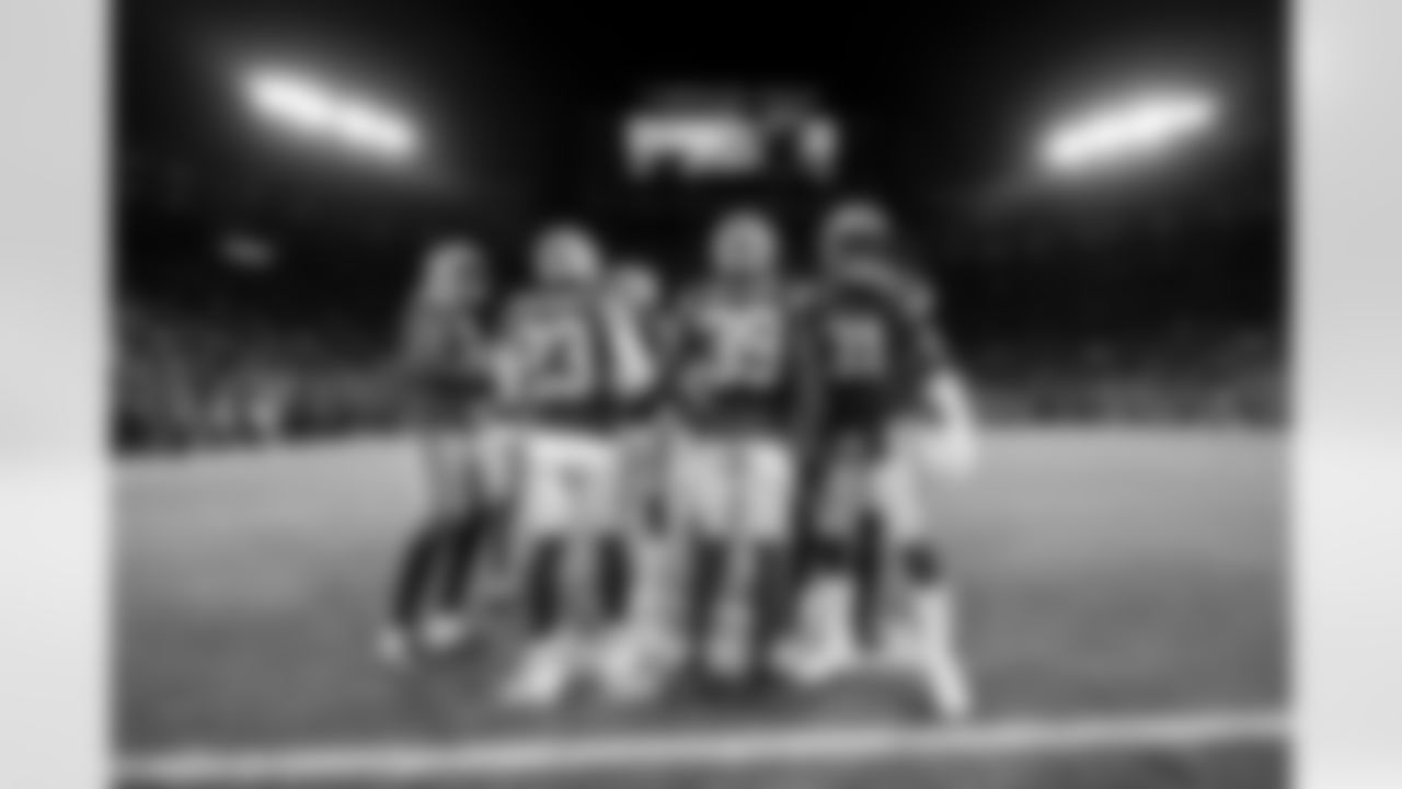 Green Bay Packers players are seen in a huddle before an NFL Divisional Round playoff game against the San Francisco 49ers on Saturday, January 22, 2022 in Green Bay, Wisconsin. (Ryan Kang/NFL)