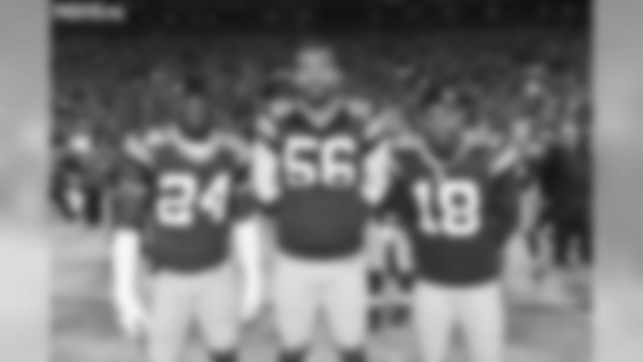 24 Jarrett Bush, #56 Julius Peppers, #18 Randall Cobb