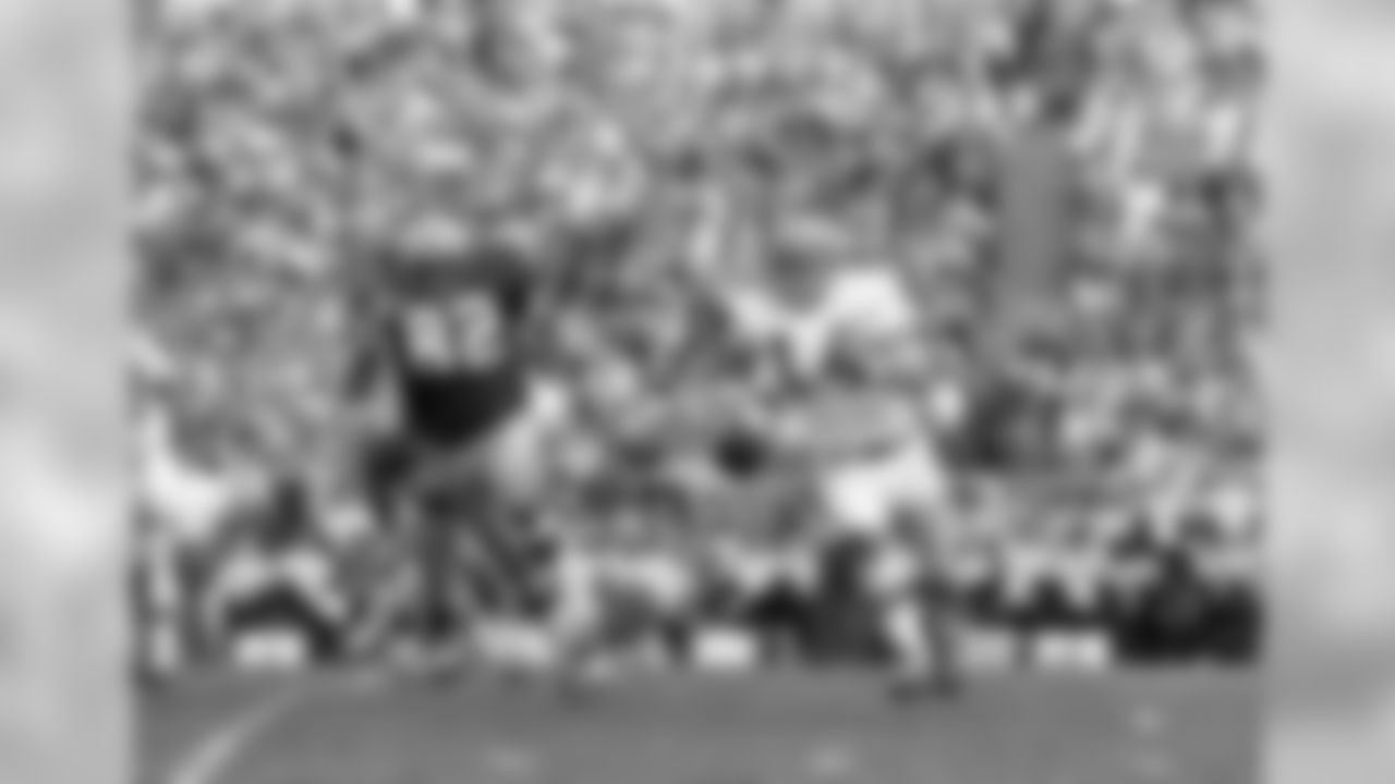 Bengals' QB Ken Anderson (14) picks up first-down yardage with a quarterback draw during the final quarter against the Packers at Lambeau Field, Oct. 3, 1971. The Packers won, 20-17