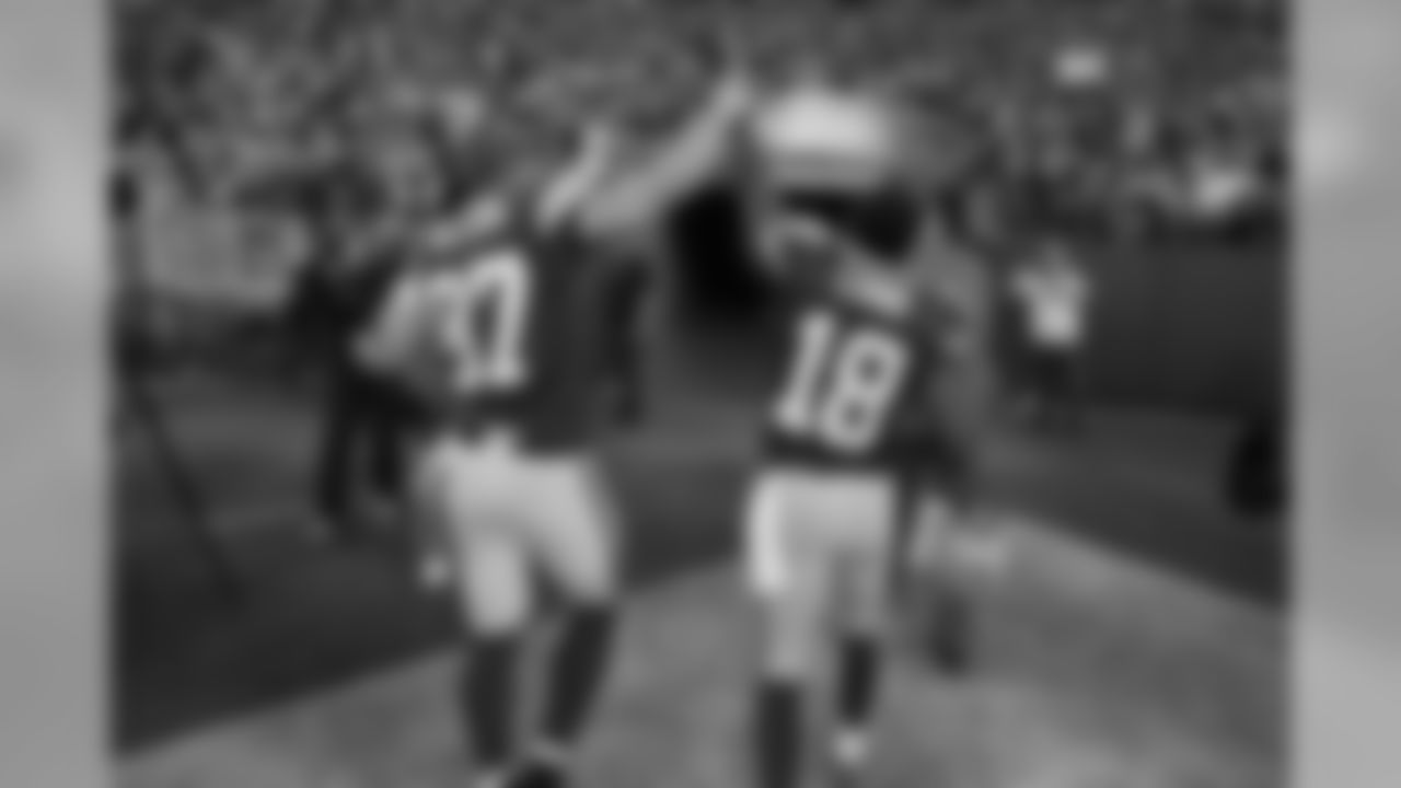 Cobb and Nelson became the first duo in NFL history to record 90-plus receptions, 1,200-plus yards and 12-plus touchdown receptions in the same regular season.