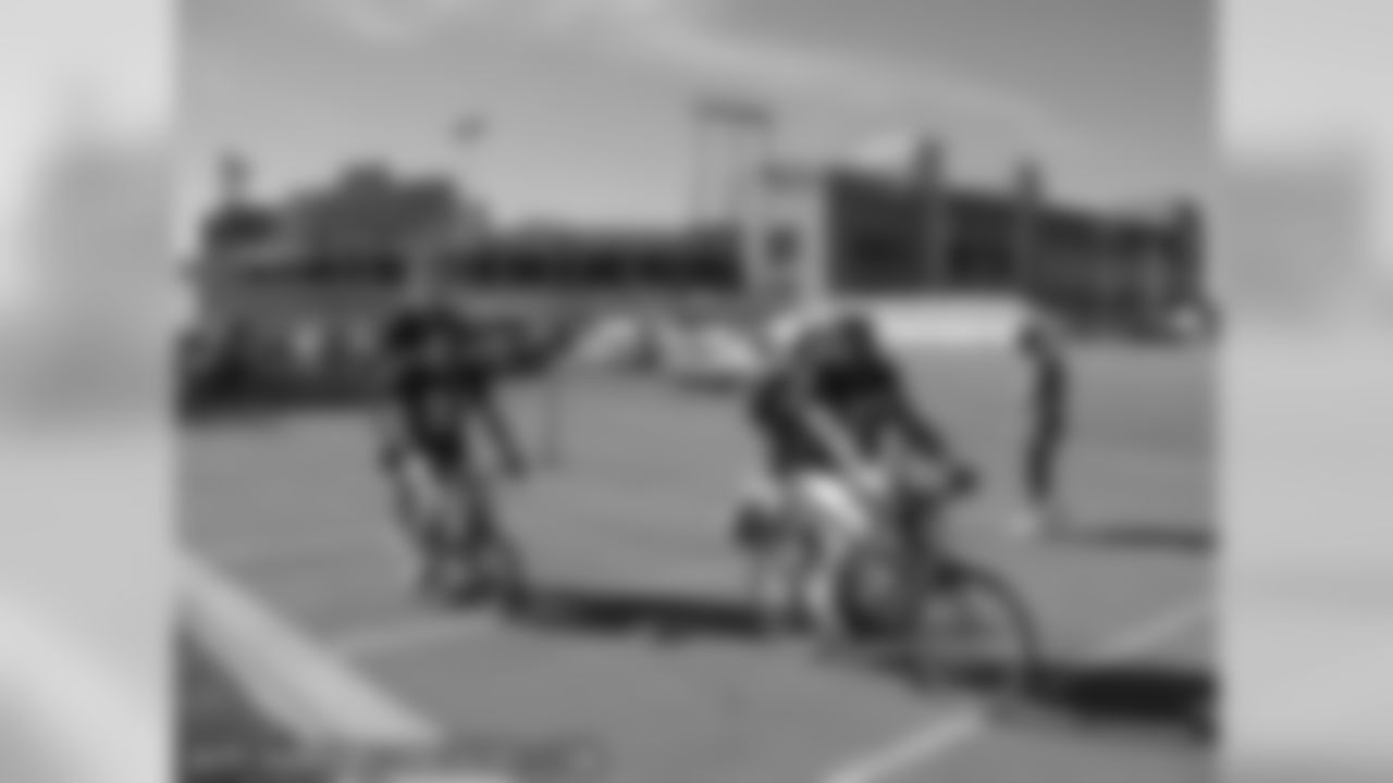 Bills Ride Bikes To Meet Packers At Practice